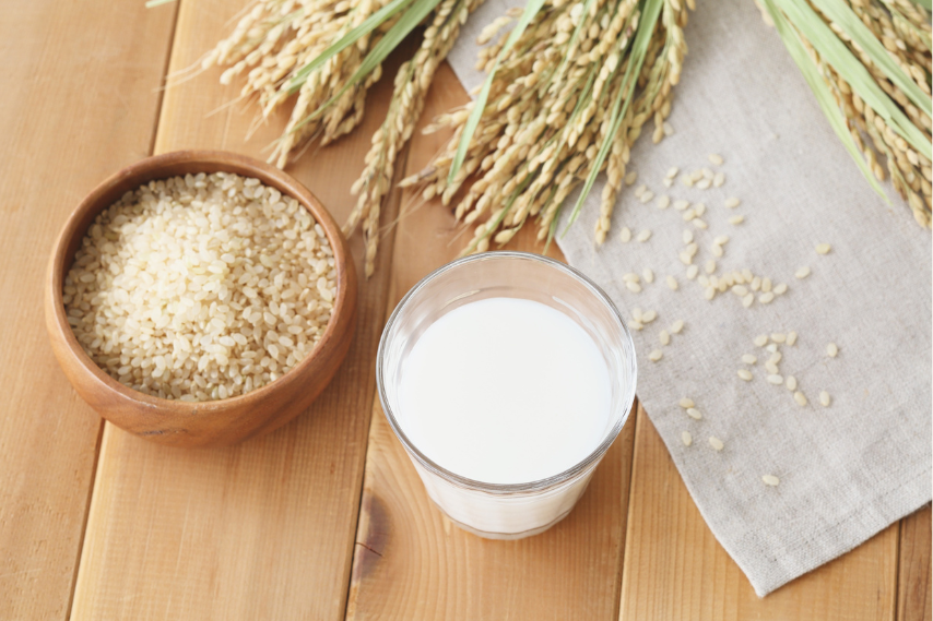 Rice and ginseng ingredients on wooden table